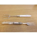 A small silver bread fork with Mother-of-Pearl handle and a silver fork with Mother-of-Pearl