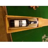 A bottle of 1994 vintage port by Smith, Woodhouse & Co in wooden presentation box.