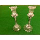 A pair 20th century pedestal candlesticks with double coloured spiral twist columns.