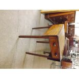 A small late 18th century mahogany drop flap table with single drawer with turned knob handles.