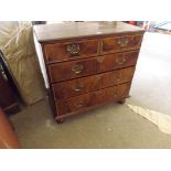 An 18th century chest of walnut fronted, 3 long and 2 short drawers with drop handles and brass