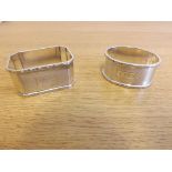 Two silver napkin rings hallmarked Birmingham, one engraved "RJC", the other "RJPC", weighing