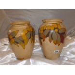 PAIR OF CLIFTON MID CENT VASES 10" TALL BROWN MATT BASE WITH FOILAGE EST[£15- £25]