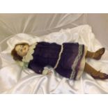 BISQUE HEAD DOLL,LEATHER BODY WITH SLEEPING EYES EST[£60-£80]