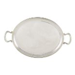 A silver oval tray with two handles Padova, 20th century peso 1180 gr.