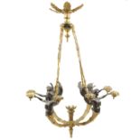 An Empire style four lights chandelier France, antique manufacture 118x76 cm.