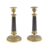 A pair of bronze candlesticks late 19th-early 20th century h. 22 cm.