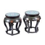 A pair of lacquered wood and enamel stools China, 20th century 53x37,5 cm.