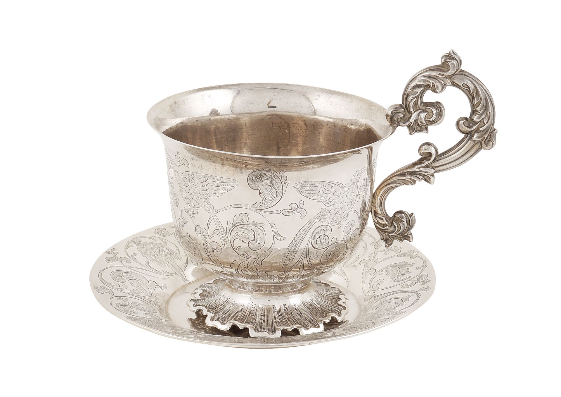 A silver cup with its plate Rome, late 19th century d. 6 cm. - 13x11 cm.