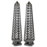 A pair of iron obelisks 20th century 210x40x40 cm.