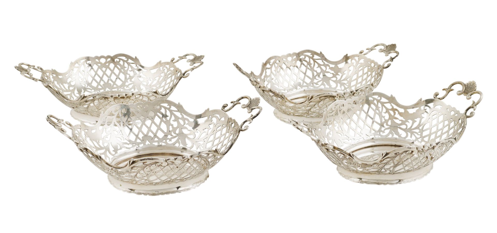 Four silver baskets Netherlands, 19th century 7,5x22,5x14,5 cm.