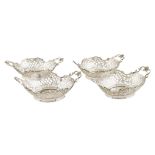 Four silver baskets Netherlands, 19th century 7,5x22,5x14,5 cm.