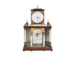 A walnut and ebonized wood pendulum clock 60x38x15 cm.