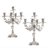 A pair of five-lights silver candelabra Italy, 20th century peso 6350 gr.