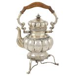 A silver tea kettle Italy, 20th century peso 1703 gr.