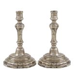 A pair of silver chandlesticks Rome, 18th century peso 600 gr.