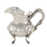 A silver milk jug Italy, 20th century peso 390 gr.