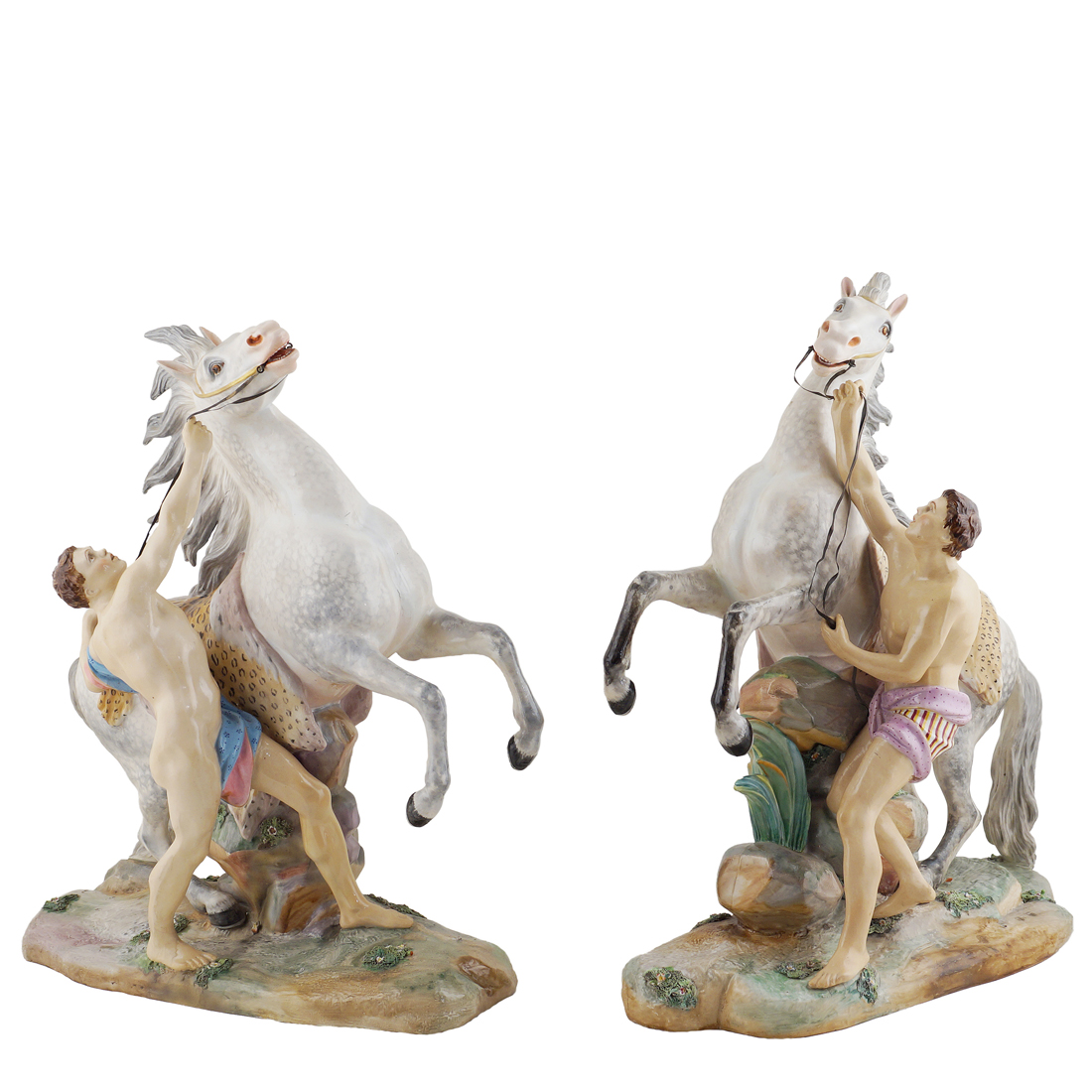 Two policromatic porcelain groups European manufacture, early 20th century 56x50x23 cm.