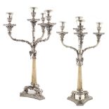 A pair of four lights silver candelabra Italy, mid 20th century peso lordo 3300 gr.