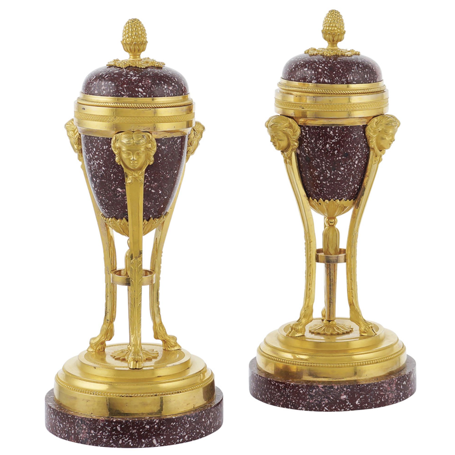 A pair of red porphyry cassolettes France, 19th century h. 23,5 cm.