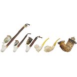 A collection of six pipes 20th century h. massima 36 cm.