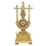 A golden bronze chimney pendulum clock France, 19th century 45x17,5x7,5 cm.