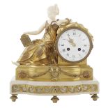 A golden bronze Louis XVI pendulum clock France, 19th century 35x31x11 cm.