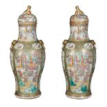 A pair of polychrome Canton porcelain vases China, XX century h. 70 cm.