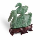 A jadeite group Cina, 20th century h. 12 cm.