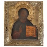 A Russian icon with silvered metal riza early 20th century 18,5x15 cm.