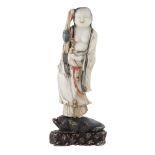 Wise shaped figure in saponary stone Cina, Qing dinasty 19th century h. 55 cm.