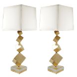 A pair of brass table lamps France, 20th century h. 78 cm.