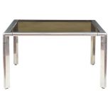 A steel and glass table 20th century 73x130x130 cm.