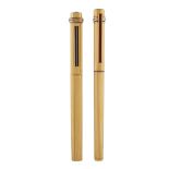 Must de Cartier, two gilt coated vintage pens France