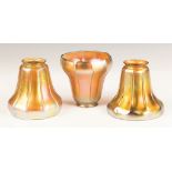 Three Steuben Gold Aurene Shades. Three Steuben Gold Aurene Shades. Early 20th century. Signed.