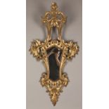 Carved and Gilt Wood Mirror. Carved and Gilt Wood Mirror. 19th Century. 47" x 24". Repair to