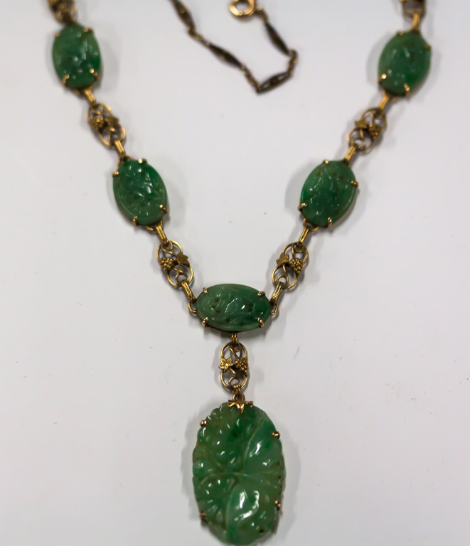 Carved Jade and Gold Necklace. Carved Jade and Gold Necklace. Wearable L 17 1/2"; Pendant: 1 1/4"