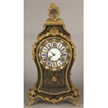 Gilt Bronze and Boulle Mantle Clock. Gilt Bronze and Boulle Mantle Clock. 19th century. Porcelain