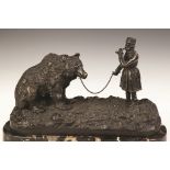 After Evgeni Lanceray (Russian, 1875-1946) Bronze Group of a Man with Bear. After Evgeni Lanceray (
