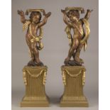 Carved and Painted Putti Stands. Carved and Painted Putti Stands. Late 19th century. Ht. 49" Max.