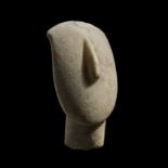 A Large Cycladic Marble Head, Late Spedos Variety, Early Cycladic II, ca. 2500-2400 BC.Late Spedos