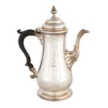 George III Sterling Silver Coffee Pot.Coat of arms. 29.8 ozt. Ht. 10 1/2".Online bidding