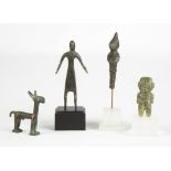 Four Early Metal and Stone Figures.L to R: Peruvian Metal Figure Of Chimú Llama; c. 1300; Spencer