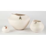 Jacquie Stevens (American, B. 1949) Three Bowls.L to R: Round, white ceramic vessel with signature