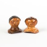 Two Decorated Redware Doll Heads.19th century.Max. Ht. 3" W 2 1/2".Online bidding available: