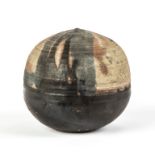 Toshiko Takaezu (American, 1929-2011) Closed Form.c. 1974. Signed. Spherical vessel with muted