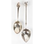 Two Sterling Silver Serving Spoons.Gorham slotted spoon with rat; monogrammed. Ball Black & Co.