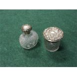 A 19th century cut glass perfume bottle with silver top and original stopper together with a