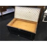 A wooden brass studded chest with tray inner and candle box.
