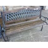 An aluminium garden bench with lattice back and wooden slats.